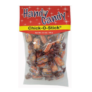 A clear Handy Candy CHICK-O-STICK bag holds individually wrapped orange candies. The package features a red top with white stars, a yellow net weight stripe, and contains 3.5 oz (99 g) of candy.