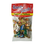 Handy Candy ASSORTED TOFFEES comes in a clear plastic bag with 4.5 oz (127 g) of individually wrapped toffees in gold, green, and red colors.